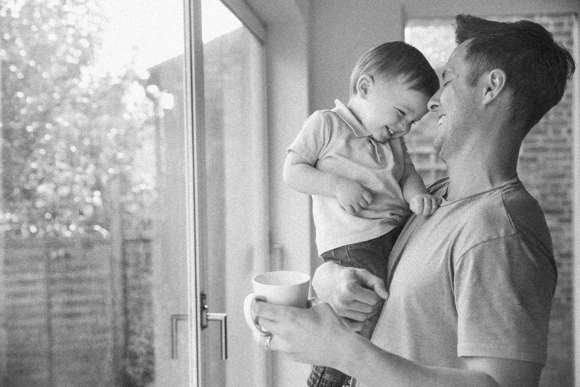 happy man with son in online outpatient treatment for substance abuse through EHN Health USA